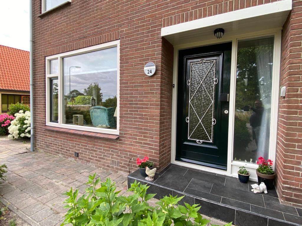 Huis Bij Het Water Met Sloepje Jutrijp Exteriör bild